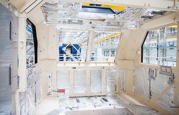 Электровозосборочный завод. Камера покраски железнодорожной техники.