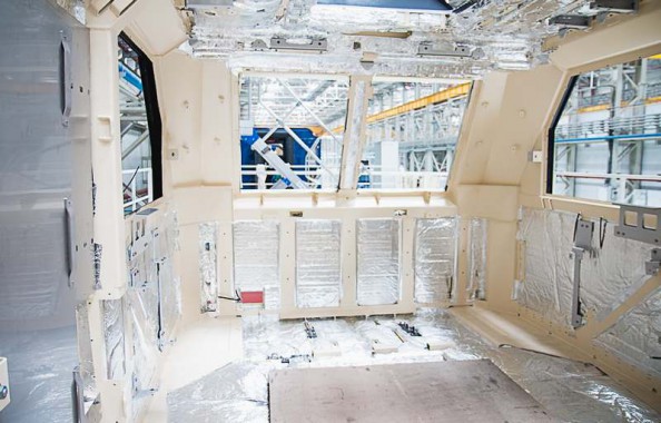 Электровозосборочный завод. Камера покраски железнодорожной техники.